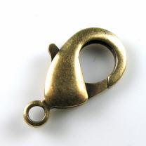 Feder- Ring mit Öse Gold